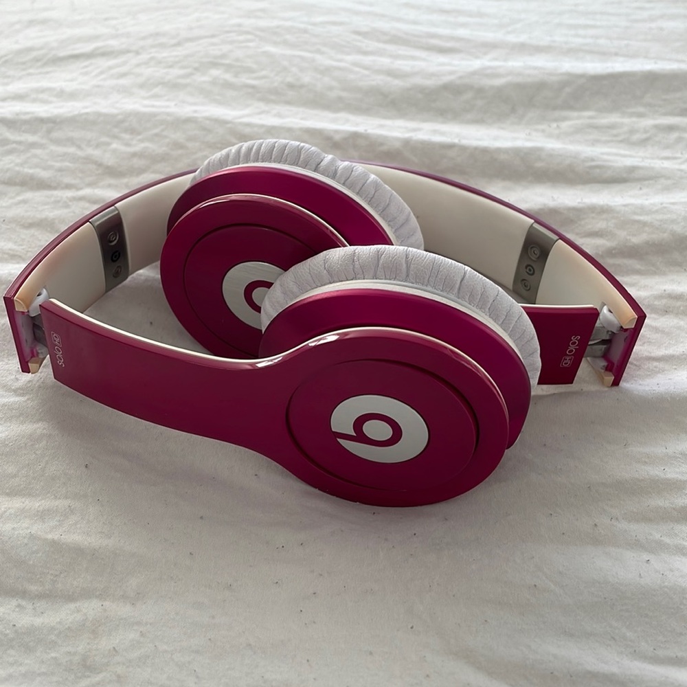 Hot pink Beats by Dre Solo HD headphones